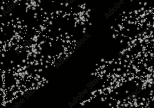 Beautiful silver star confetti scattered on a black background creating a festive and celebratory atmosphere perfect for special occasions and events.