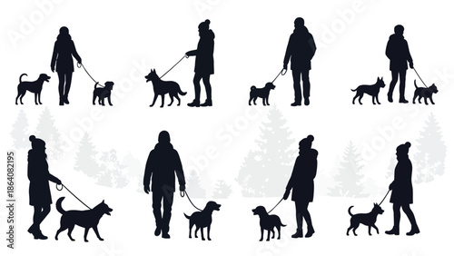 People walking dogs in winter clothes