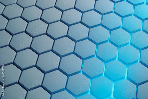 Abstract blue hexagonal honeycomb pattern background with light reflection