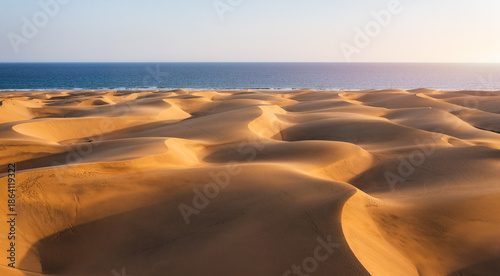 View of the Natural Reserve of Dunes of Maspalomas, in Gran Canaria, Canary Islands, Spain. Beautiful view of Maspalomas Dunes on Gran Canaria, Canary Islands, Spain.