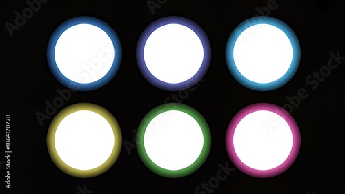 Six glowing circular lights with distinct colored rings on a dark background, arranged in two rows.