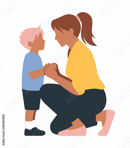 A woman kneels to speak to a young boy, emphasizing the importance of connection and communication between a parent and child in a nurturing environment.