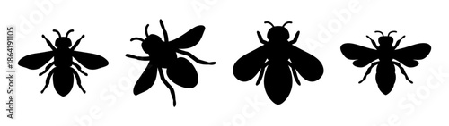 Silhouettes of bees in flight