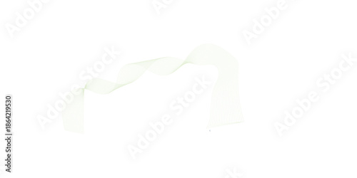 Clean milk pouring into a glass with a white milk splash isolated on a blank sheet of paper and an empty tea bag box