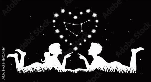 Couple lying on grass pointing at constellations in night sky