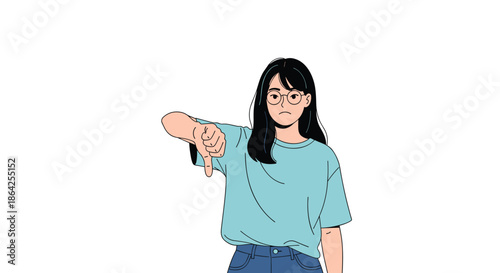 An unhappy young woman with glasses and long black hair showing a thumbs-down gesture to express her disapproval or dislike.