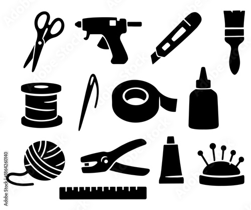 Crafting tools set: scissors, glue gun, needle, tape, yarn, ruler, brush, paint tube, pin cushion.
