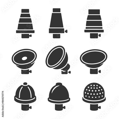 Variety of photography studio light modifiers silhouetted on white background.
