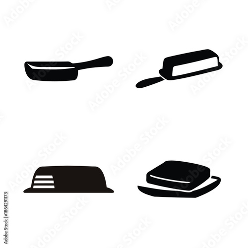 Essential kitchenware and dining items featuring a frying pan, butter dishes, and food cover