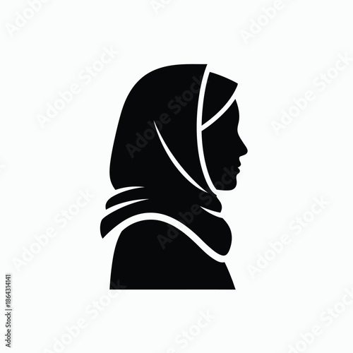 Silhouette of a woman in hijab