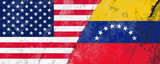 Flags of the United States and Venezuela on a cracked concrete wall representing diplomatic tensions and the current political crisis, a concept of geopolitical conflict