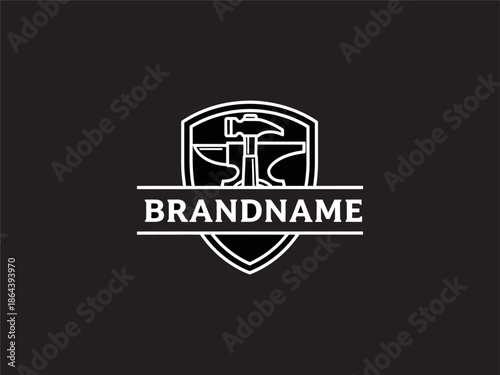 White Shield Logo with Hammer Design Element.