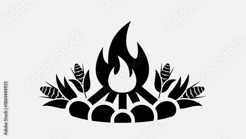 Stylized black silhouette of a bonfire surrounded by corn cobs and leaves, representing harvest or autumn celebration.