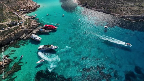 Very beautiful fly over the ships and recreation area at Blue Lagoon, Comino (2/2)