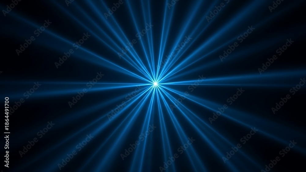 Fototapeta premium Vibrant blue light rays exploding from a central point in darkness