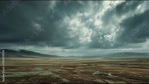 Dramatic Mountain Landscape with Stormy Sky and Vast Open Moorland