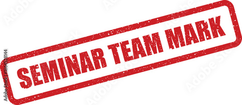 Textured red rubber stamp displaying the message seminar team mark identifying official designation or a label from a group