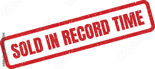 Textured red rubber stamp proudly announcing a remarkable sale achieved faster than ever before, signifying exceptional market performance