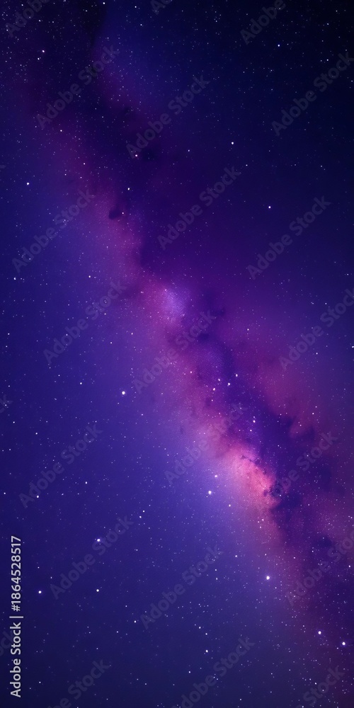 Fototapeta premium The majestic Milky Way stretches across a dark, velvety sky, a celestial spectacle of bright stars and soft purple hues, night sky, vast