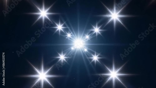 Bright light shining in dark space with starburst effect