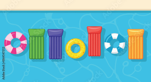 An aerial top view of colorful inflatable rings and mattresses floating in a row in a clear blue swimming pool for summer.