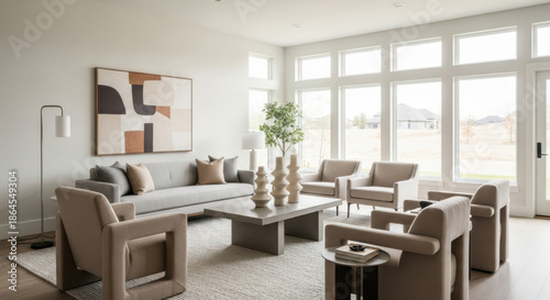 Bright Living Room with Large Windows and Neutral Furniture