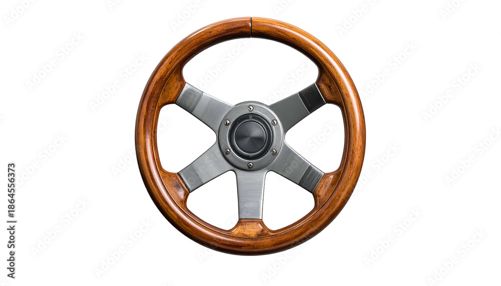 Obraz premium Close-up of a classic wooden steering wheel with silver spokes and a center hub, isolated against a black background