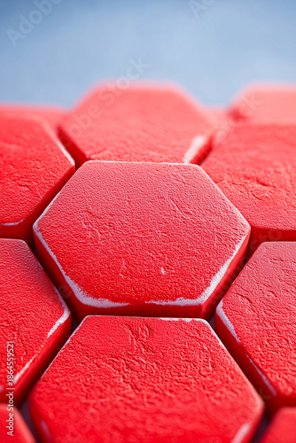 Red hexagonal tiles in a closeup view against sky
