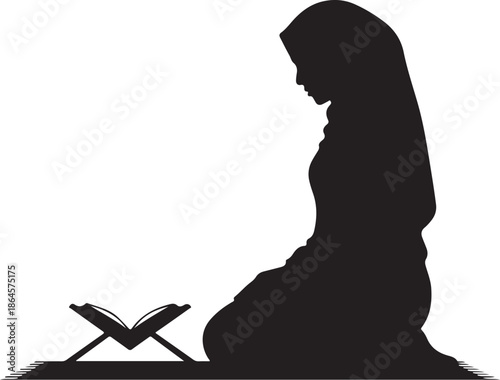 Silhouette of person praying with open book in front
