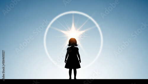 Silhouette of a young girl standing in front of a bright sun with a halo, looking up at sunrise or sunset with a clear blue sky with light and circle
