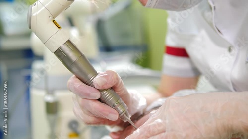 Male patient getting laser complexion cleaning in modern spa center, facial skin care and treatment. Laser beauty clinic. Skin polishing using laser technologies. Modern innovative medical equipment