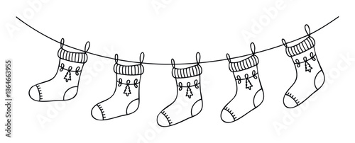 Festive Christmas stockings hanging on a string create a cheerful seasonal decoration, perfect for holiday greeting projects, winter event invitations, or celebration decor