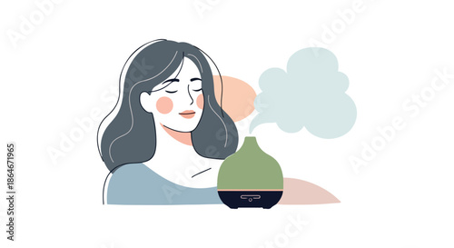 Woman relaxing with aromatherapy diffuser