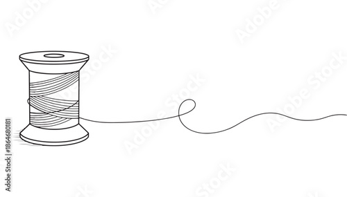 A spool of thread with loose end