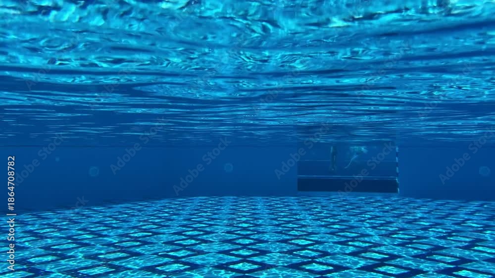 Underwater camera captures mesmerizing sunlight patterns in the pool ...