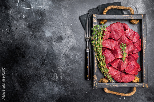 Bild auf Leinwand Diced Roe Deer meat, raw Venison Wild Game Meat