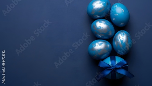 Sophisticated Dark Blue Easter Flat Lay: Textured Eggs, Ribbon, and Minimalist Copy Space