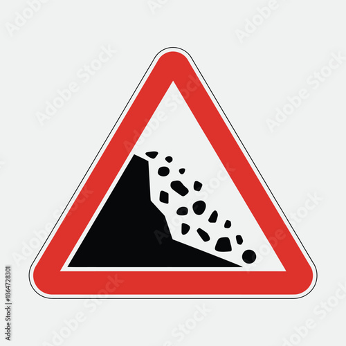 Road sign warning of rockfall or landslide ahead