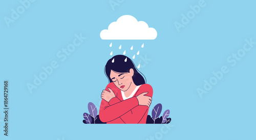 Young woman with a sad expression hugging herself while standing in the rain under a single white cloud on a blue background.