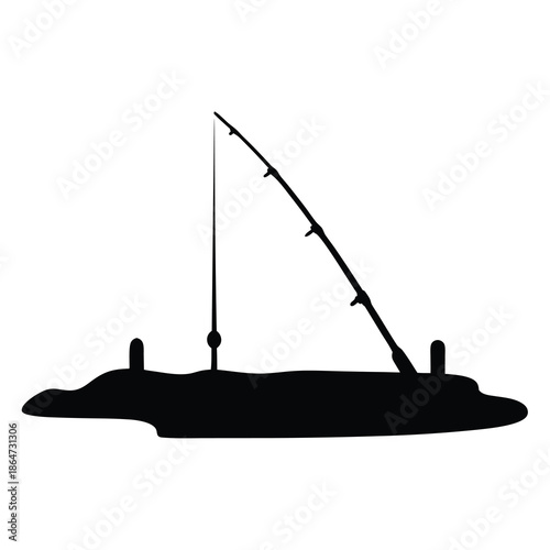 Black silhouette of a fishing rod in fishing support and ground