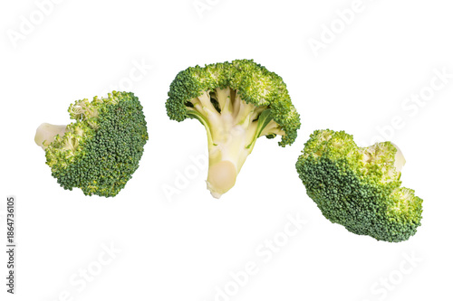 Fresh raw broccoli pieces isolated on white background. top view