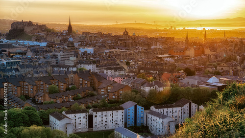 Sunset panoramic view over Edinburgh city from Arthurs Seat hill in Scotland