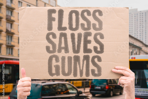 фотографія "Floss Saves Gums" Interdental cleaning protects periodontal health