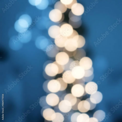 Blurry Christmas Lights on Blue Background.