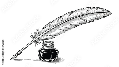 Vintage inkwell with a large feather quill pen