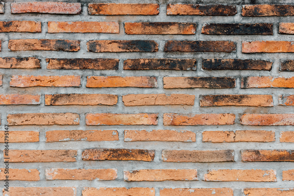 Fototapeta premium Detailed Texture of Vintage Brick Wall with Unique Color Variations