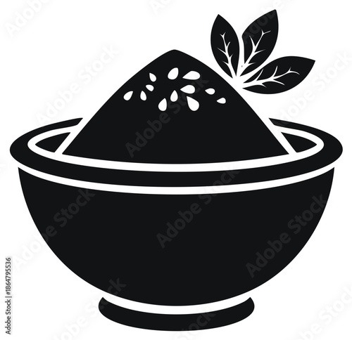 Black Bowl Full of Powder with Leafy Garnish