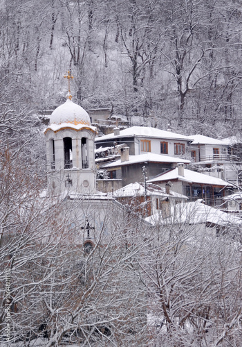View of snowy church in winter