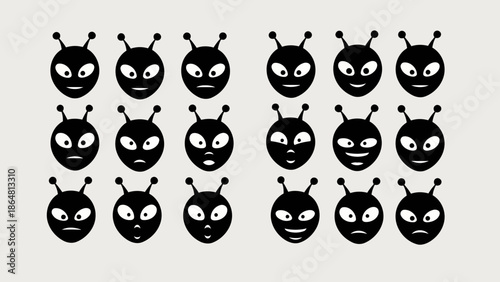 A collection of black and white alien faces with varying expressions displayed
