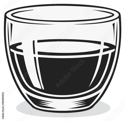 Bold black coffee in a clear glass cup with reflective highlights